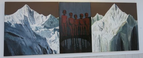triptych of mountains and people